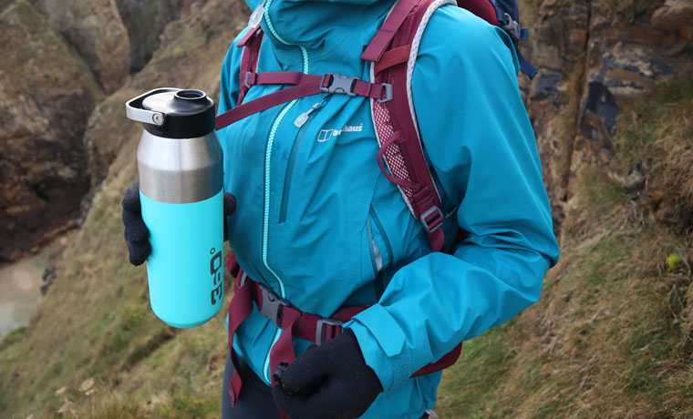Blue metal water bottle for hiking