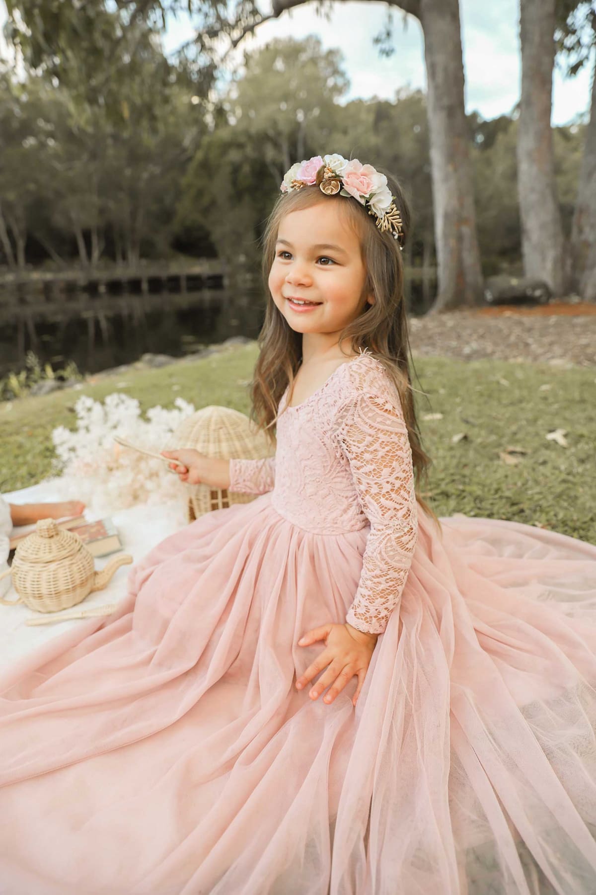 little girl in pink designer dress