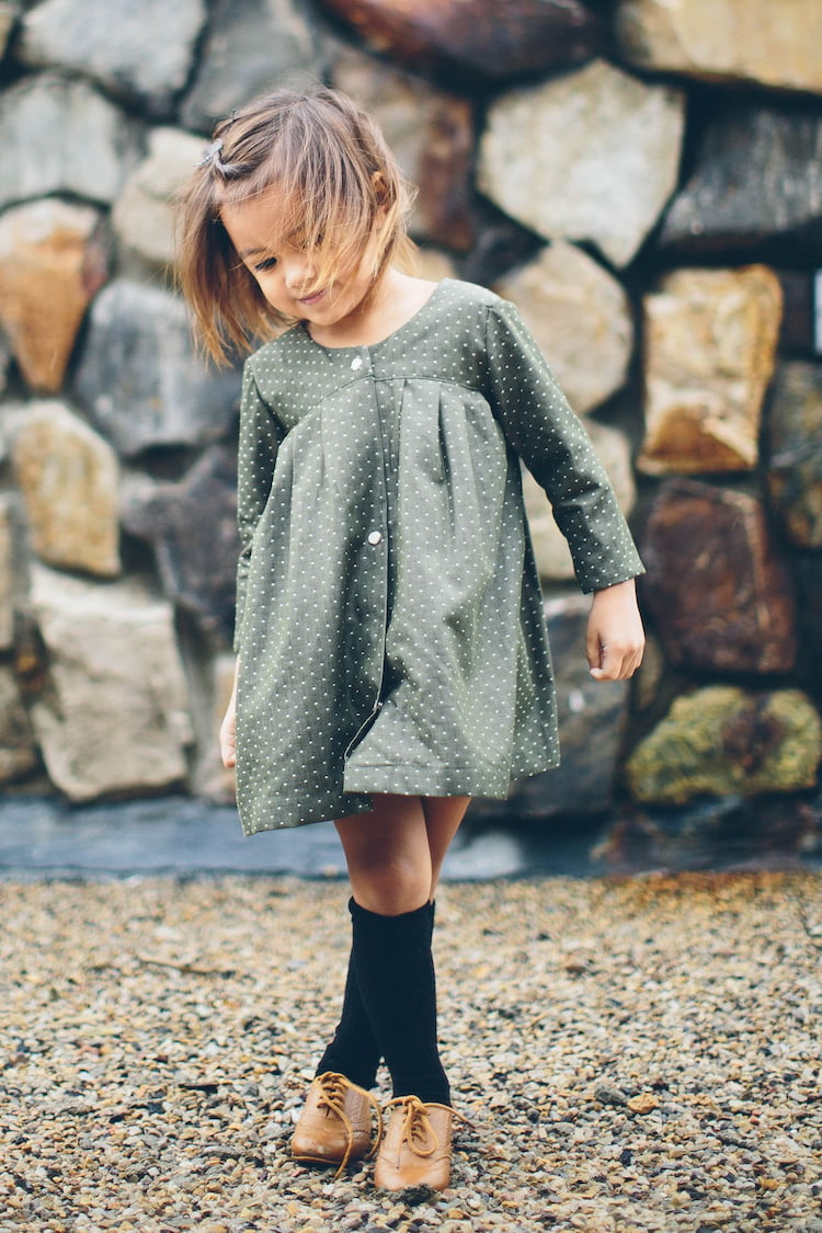 little girl wearing evergreen style dress